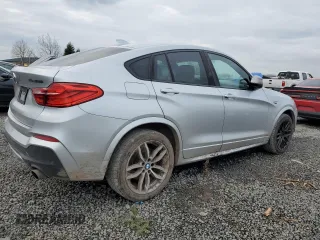 2017 BMW X4 M40i with VIN 5UXXW7C57H0U25268, listed as a Copart auction lot 40370884 with 99,387 mi miles. Bid and sale history available at carsss.com. Image 3.