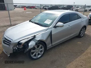 2014 Cadillac ATS Luxury RWD with VIN 1G6AB5RX7E0143954, listed as a IAAI auction lot 42156629 with 79,619 mi miles and . Bid and sale history available at DreamBid. Image 2.