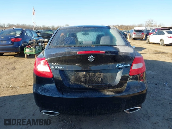 2010 Suzuki Kizashi SE with VIN JS2RE9A34A6100807, listed as a IAAI auction lot 41690974 with 122,419 mi miles and . Bid and sale history available at DreamBid. Image 16.