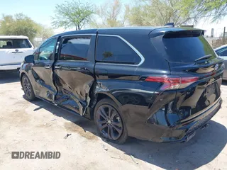 2021 Toyota Sienna XSE with VIN 5TDXRKEC6MS021909, listed as a IAAI auction lot 42432609 with 57,295 mi miles and . Bid and sale history available at DreamBid. Image 3.