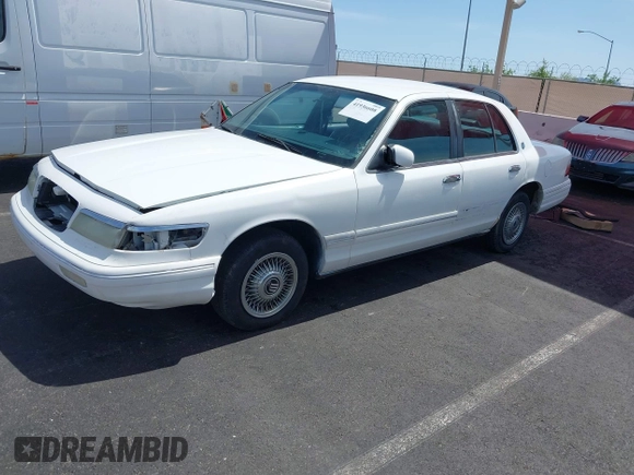 1996 Mercury Grand Marquis GS with VIN 2MELM74WXTX650841, listed as a IAAI auction lot 41936608 with 205,964 mi miles and . Bid and sale history available at DreamBid. Image 2.