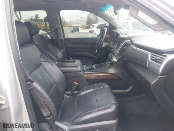 2015 Chevrolet Tahoe LT with VIN 1GNSCBKC5FR121069, listed as a IAAI auction lot 41799529 with 216,869 mi miles. Bid and sale history available at carsss.com. Image 5.