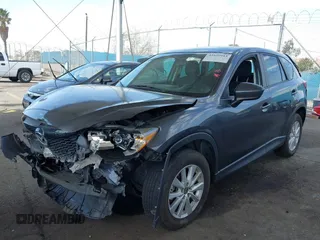 2014 Mazda CX-5 Touring with VIN JM3KE2CY9E0384401, listed as a IAAI auction lot 41699913 with 75,301 mi miles. Bid and sale history available at carsss.com. Image 17.