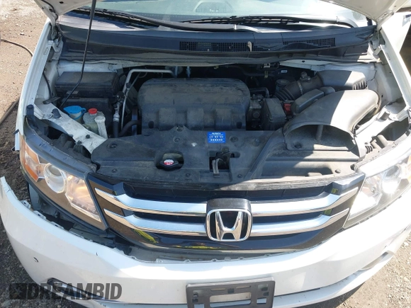 2014 Honda Odyssey Touring with VIN 5FNRL5H94EB071788, listed as a IAAI auction lot 42523959 with 244,734 mi miles and . Bid and sale history available at DreamBid. Image 10.