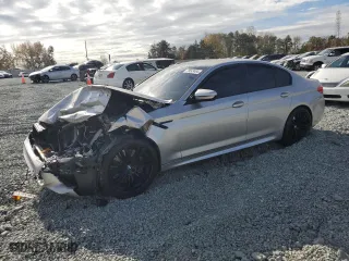2020 BMW M5 with VIN WBSJF0C01LCD17721, listed as a Copart auction lot 79543404 with 0 mi miles and Salvage Title. Bid and sale history available at carsss.com. Image 1.