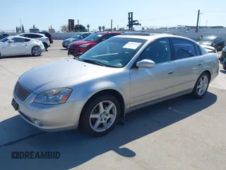 2002 Nissan Altima SE with VIN 1N4BL11E72C169164, listed as a IAAI auction lot 41992002 with 100,211 mi miles. Bid and sale history available at carsss.com. Image 2.