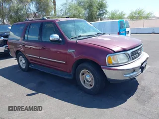 1997 Ford Expedition XLT z VIN 1FMFU18LXVLB10543, wystawiony jako IAAI lot #42410177 z przebiegiem 245 413 mil mil oraz . Historia ofert i sprzedaży dostępna na DreamBid. Obrazek 1.