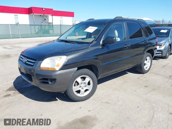 2007 Kia Sportage LX with VIN KNDJF724877313178, listed as a IAAI auction lot 41863492 with 199,138 mi miles. Bid and sale history available at carsss.com. Image 18.