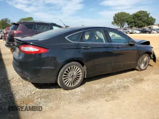 2016 Ford Fusion Titanium z VIN 3FA6P0K98GR151640, wystawiony jako Copart lot #73254594 z przebiegiem 145 473 mil mil oraz Szkoda całkowita • Salvage title. Historia ofert i sprzedaży dostępna na DreamBid. Obrazek 3.