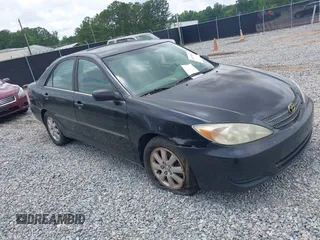 2002 Toyota Camry XLE z VIN 4T1BF30K72U004905, wystawiony jako IAAI lot #42419201 z przebiegiem 307 655 mil mil oraz . Historia ofert i sprzedaży dostępna na DreamBid. Obrazek 1.