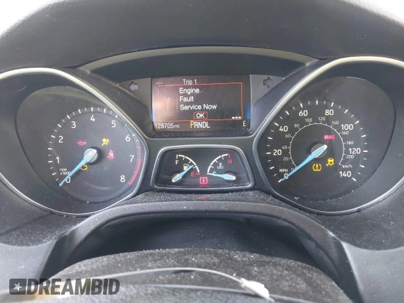 2015 Ford Focus SE with VIN 1FADP3F29FL210973, listed as a IAAI auction lot 41874367 with 128,705 mi miles. Bid and sale history available at carsss.com. Image 7.