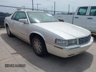 1996 Cadillac Eldorado z VIN 1G6EL12Y9TU600358, wystawiony jako IAAI lot #42259458 z przebiegiem 109 751 mil mil oraz . Historia ofert i sprzedaży dostępna na DreamBid. Obrazek 1.
