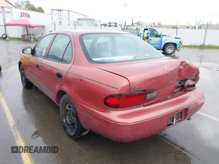 1997 Geo Prizm LSi with VIN 1Y1SK5265VZ457659, listed as a IAAI auction lot 41778510 with 149,073 mi miles. Bid and sale history available at carsss.com. Image 3.