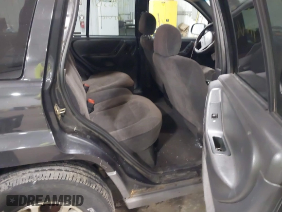 1999 Jeep Grand Cherokee Laredo with VIN 1J4GW58SXXC649579, listed as a IAAI auction lot 42365959 with 199,742 mi miles and . Bid and sale history available at DreamBid. Image 8.