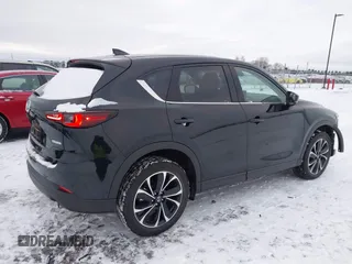 2023 Mazda CX-5 2.5 S Premium Plus Package with VIN JM3KFBEM6P0172890, listed as a IAAI auction lot 41312358 with 19,574 mi miles. Bid and sale history available at carsss.com. Image 4.