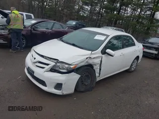 2011 Toyota Corolla L with VIN 2T1BU4EE1BC693128, listed as a IAAI auction lot 41948555 with 135,263 mi miles. Bid and sale history available at carsss.com. Image 2.