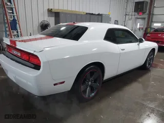 2013 Dodge Challenger SXT with VIN 2C3CDYAG8DH554016, listed as a IAAI auction lot 41275678 with 55,826 mi miles. Bid and sale history available at carsss.com. Image 4.