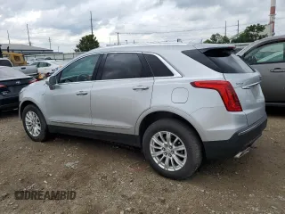 2018 Cadillac XT5 FWD z VIN 1GYKNARS0JZ110512, wystawiony jako Copart lot #64165275 z przebiegiem 98 504 mil mil oraz Czysty tytuł • Clean title. Historia ofert i sprzedaży dostępna na DreamBid. Obrazek 2.