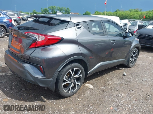 2018 Toyota C-HR XLE with VIN NMTKHMBX6JR021855, listed as a IAAI auction lot 42158449 with 140,945 mi miles and . Bid and sale history available at DreamBid. Image 4.