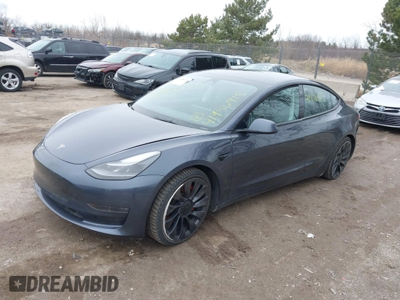 2023 Tesla Model 3 Performance with VIN 5YJ3E1EC9PF407365, listed as a IAAI auction lot 41956915 with 31,087 mi miles. Bid and sale history available at carsss.com. Image 2.