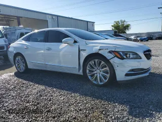 2018 Buick LaCrosse Premium with VIN 1G4ZR5SS4JU144620, listed as a Copart auction lot 48821025 with 123,007 mi miles and Salvage Title. Bid and sale history available at carsss.com. Image 4.