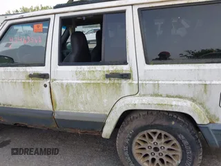 1999 Jeep Cherokee Sport z VIN 1J4FF68S0XL663735, wystawiony jako IAAI lot #42463562 z przebiegiem Nie podano mil oraz . Historia ofert i sprzedaży dostępna na DreamBid. Obrazek 13.