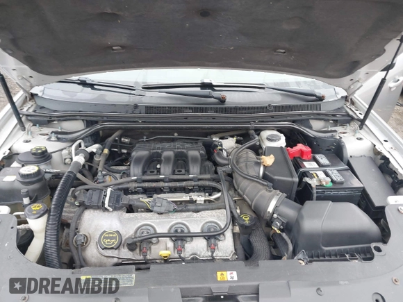 2008 Ford Taurus SEL with VIN 1FAHP24W68G122802, listed as a IAAI auction lot 42020217 with 168,265 mi miles. Bid and sale history available at carsss.com. Image 10.