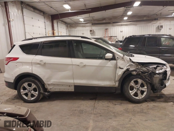 2016 Ford Escape SE with VIN 1FMCU9GX9GUC69153, listed as a IAAI auction lot 41504167 with 149,115 mi miles and . Bid and sale history available at DreamBid. Image 13.