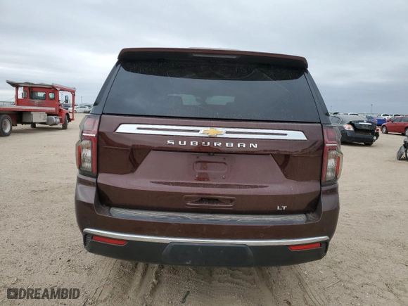 2022 Chevrolet Suburban LT with VIN 1GNSKCKDXNR251915, listed as a Copart auction lot 76591264 with 72,143 mi miles and Clean Title. Bid and sale history available at carsss.com. Image 6.