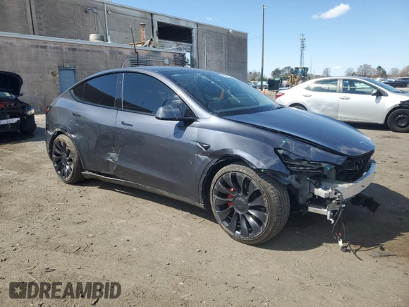 2023 Tesla Model Y Performance with VIN 7SAYGDEF3PF946496, listed as a Copart auction lot 50800315 with 15,077 mi miles and Salvage Title. Bid and sale history available at DreamBid. Image 4.