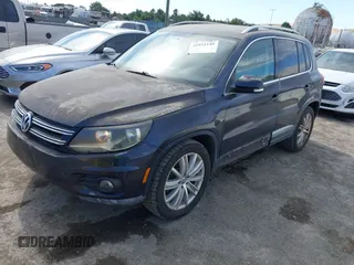 2012 Volkswagen Tiguan S with VIN WVGAV7AX9CW546724, listed as a IAAI auction lot 42831149 with 103,528 mi miles and . Bid and sale history available at DreamBid. Image 2.