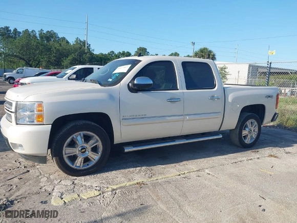 2013 Chevrolet Silverado 1500 LTZ with VIN 3GCPKTE76DG268911, listed as a IAAI auction lot 41977057 with 123,641 mi miles. Bid and sale history available at carsss.com. Image 14.