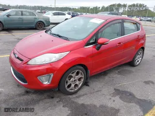 2011 Ford Fiesta SES with VIN 3FADP4FJ3BM204673, listed as a IAAI auction lot 41891902 with 145,967 mi miles. Bid and sale history available at carsss.com. Image 2.