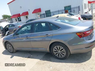 2021 Volkswagen Jetta S z VIN 3VWC57BU0MM098146, wystawiony jako IAAI lot #42201070 z przebiegiem 47 792 mil mil oraz . Historia ofert i sprzedaży dostępna na DreamBid. Obrazek 13.