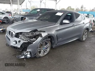 2016 BMW X6 xDrive50i with VIN 5UXKU6C59G0S82526, listed as a IAAI auction lot 41786622 with 110,796 mi miles and . Bid and sale history available at DreamBid. Image 18.