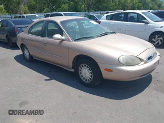 1997 Mercury Sable LS z VIN 1MELM53S2VG605209, wystawiony jako IAAI lot #42598304 z przebiegiem 151 506 mil mil oraz . Historia ofert i sprzedaży dostępna na DreamBid. Obrazek 1.