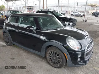2018 MINI Hardtop Cooper S z VIN WMWXP7C59J2A49312, wystawiony jako IAAI lot #42131468 z przebiegiem 64 192 mil mil oraz . Historia ofert i sprzedaży dostępna na DreamBid. Obrazek 1.