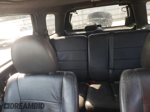 2010 Ford Escape Limited with VIN 1FMCU0E79AKA45236, listed as a Copart auction lot 60406005 with 237,385 mi miles and Salvage title. Bid and sale history available at DreamBid. Image 10.