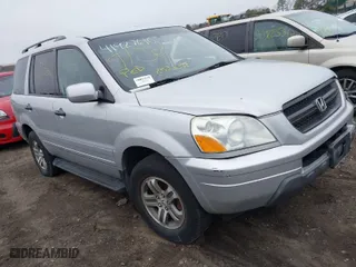 2004 Honda Pilot EX with VIN 2HKYF18494H525047, listed as a IAAI auction lot 41927610 with 999,999 mi miles. Bid and sale history available at carsss.com. Image 1.