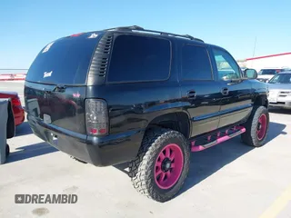 2004 Chevrolet Tahoe LT with VIN 1GNEC13ZX4R234118, listed as a IAAI auction lot 41840881 with 360,534 mi miles and . Bid and sale history available at DreamBid. Image 4.