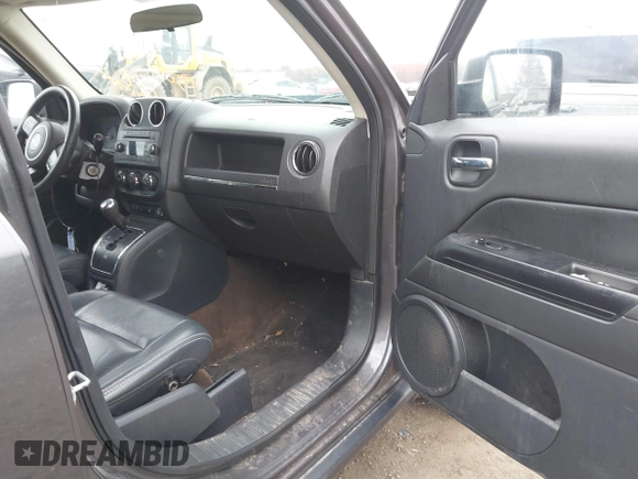 2015 Jeep Patriot High Altitude with VIN 1C4NJPFA2FD297575, listed as a IAAI auction lot 41848731 with 77,149 mi miles and . Bid and sale history available at DreamBid. Image 5.