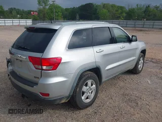 2011 Jeep Grand Cherokee Laredo with VIN 1J4RS4GGXBC564035, listed as a IAAI auction lot 41931861 with 242,291 mi miles and . Bid and sale history available at DreamBid. Image 4.