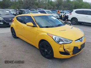 2013 Hyundai Veloster w/Black Int z VIN KMHTC6AD4DU106776, wystawiony jako IAAI lot #41886172 z przebiegiem 124 362 mil mil oraz . Historia ofert i sprzedaży dostępna na DreamBid. Obrazek 1.