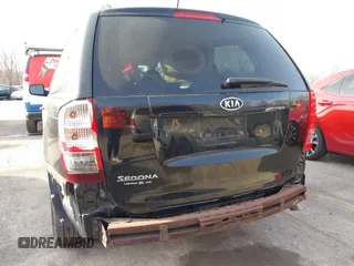 2011 Kia Sedona LX with VIN KNDMG4C70B6411556, listed as a IAAI auction lot 41768777 with 124,180 mi miles. Bid and sale history available at carsss.com. Image 6.