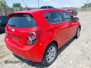 2012 Chevrolet Sonic LT with VIN 1G1JC6SH9C4128132, listed as a IAAI auction lot 42632261 with 160,029 mi miles and . Bid and sale history available at DreamBid. Image 4.