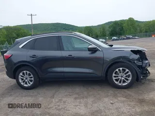 2020 Ford Escape SE z VIN 1FMCU9G68LUB54383, wystawiony jako IAAI lot #42356897 z przebiegiem 69 587 mil mil oraz . Historia ofert i sprzedaży dostępna na DreamBid. Obrazek 14.