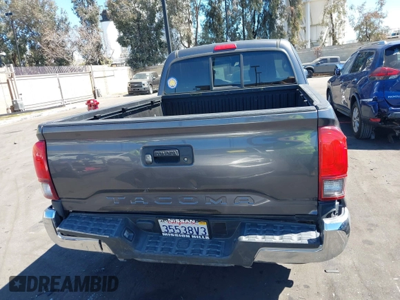 2018 Toyota Tacoma SR with VIN 5TFRX5GN1JX118441, listed as a IAAI auction lot 41870266 with 95,612 mi miles and . Bid and sale history available at DreamBid. Image 17.