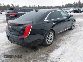 2019 Cadillac XTS Livery Package with VIN 2G61U5S33K9141430, listed as a IAAI auction lot 41426364 with 158,787 mi miles. Bid and sale history available at carsss.com. Image 4.