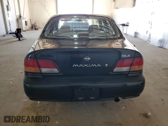 1999 Nissan Maxima GXE z VIN JN1CA21D0XT808755, wystawiony jako Copart lot #49693685 z przebiegiem 63 389 mil mil oraz Szkoda całkowita • Salvage title. Historia ofert i sprzedaży dostępna na DreamBid. Obrazek 6.