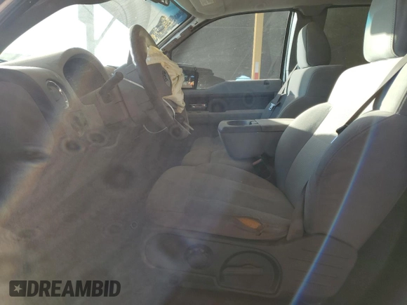 2007 Ford F-150 STX with VIN 1FTRX12W87FB32957, listed as a Copart auction lot 41818135 with 180,590 mi miles and Salvage Title. Bid and sale history available at DreamBid. Image 7.